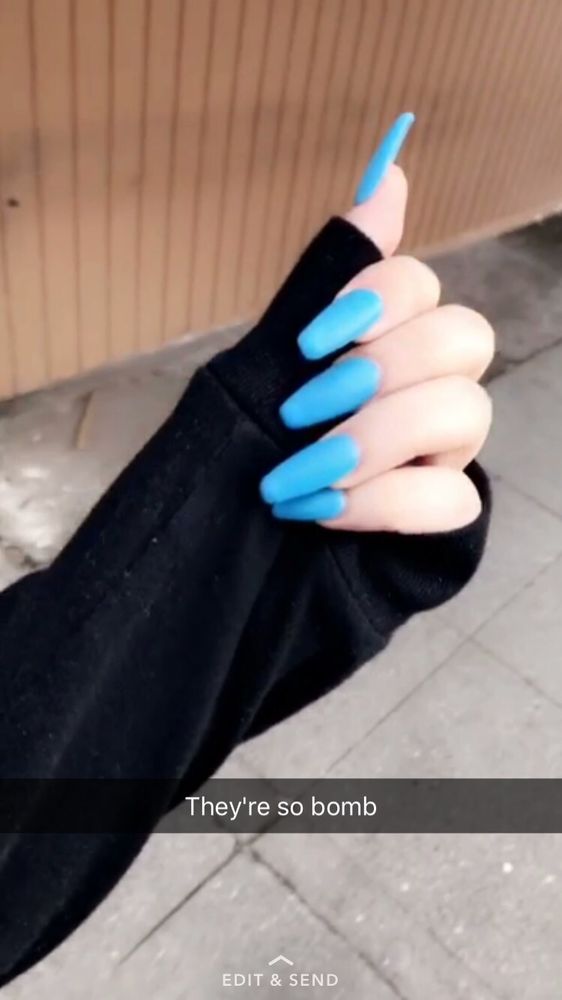 Long matte blue acrylic nails, candid customer selfie