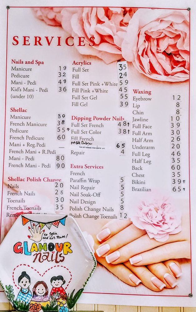 Photo of the actual services and pricing board posted in our salon